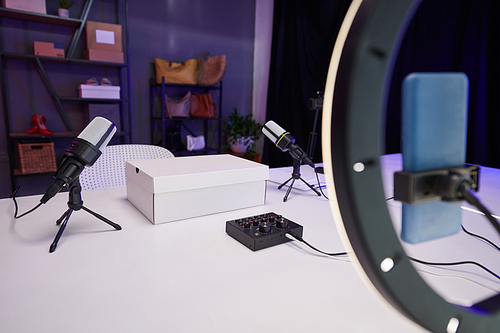 Box on desk of fashion blogger in filming studio