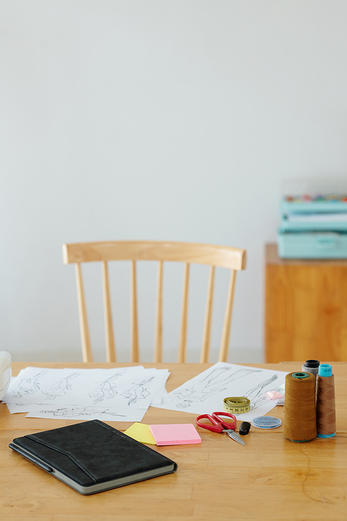 Fashion sketches on desk of fashion designer