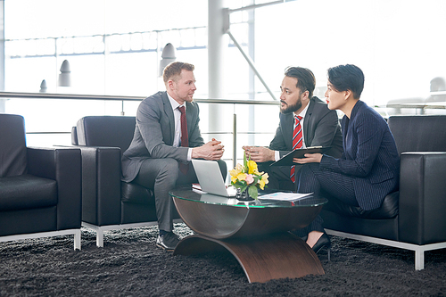 Group of business people having a meeting at modern office