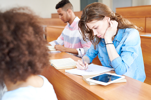 Group of college students getting knowledge at university