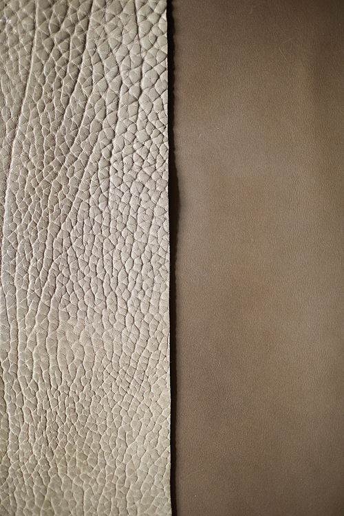 Above view background of natural leather texture in beige and grey, copy space