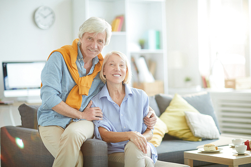 Portrait of happy mature couple  while enjoying leisure time at home, copy space