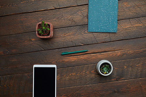 Minimal background image of smartphone and business accessories on textured wooden desk, top view, copy space