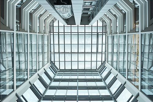 View of interior of contemporary office building made up of glass that can be used as background