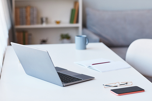 Close up background image of home office workplace with laptop, copy space