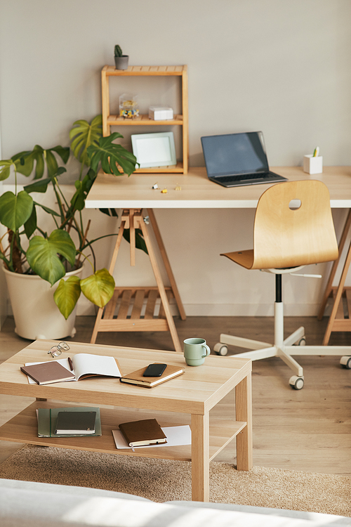 Vertical background image of cozy home office interior with wooden decor, copy space