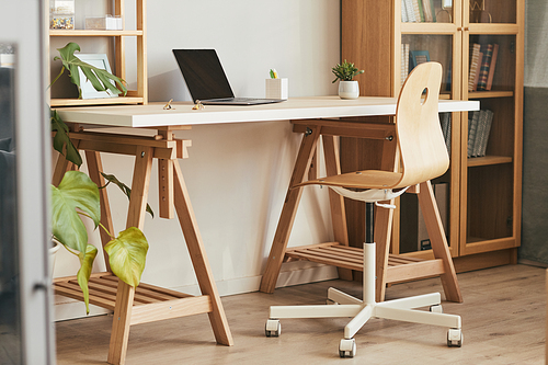 Background image of cozy home office interior with wooden furniture in apartment, copy space