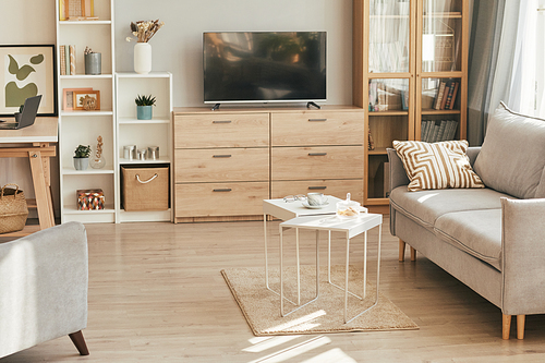 Background image of cozy apartment interior with wooden furniture lit by sunlight, copy space