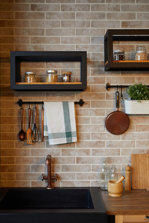 Vertical background image of kitchen interior with brick wall and rustic decor elements, copy space