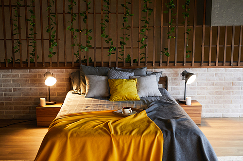 Background image of cozy bedroom interior with wooden elements and plant vines, copy space