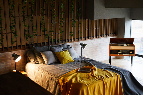 Background image of cozy bedroom interior with wooden retro elements and plant vines, copy space