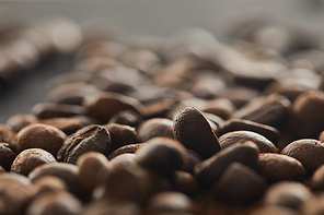 Fresh-roasted brown beans of coffee with delicious aroma