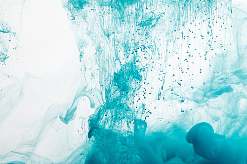 Close up view of blue paint splash in water