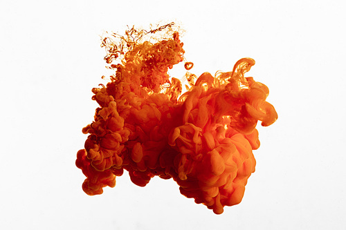 Close up view of orange paint splash isolated on white