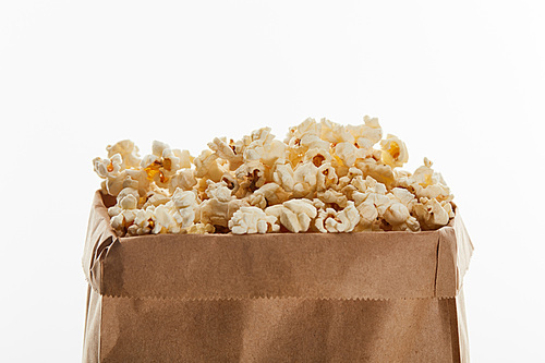 delicious popcorn in paper bag isolated on white