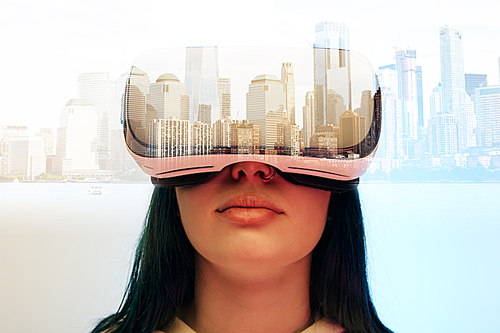 double exposure of brunette girl wearing virtual reality headset and modern city with skyscrapers