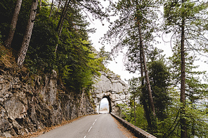beautiful mountain road with tunnel in rock, Peille, France