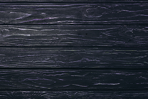 top view of black aged wooden planks surface for background
