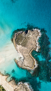 aerial view of empty little island in blue sea, Cyprus