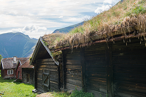 wooden building with grass growing on roof at Flam village, Aurlandsfjord, (Aurlandsfjorden), Norway