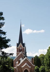 church building under blue sky in Lillehammer, Oppland, Norway