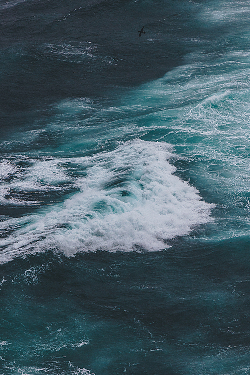 aerial view of wavy blue ocean for background