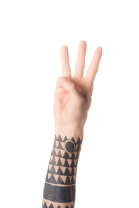 partial view of tattooed man showing letter W in deaf and dumb language isolated on white