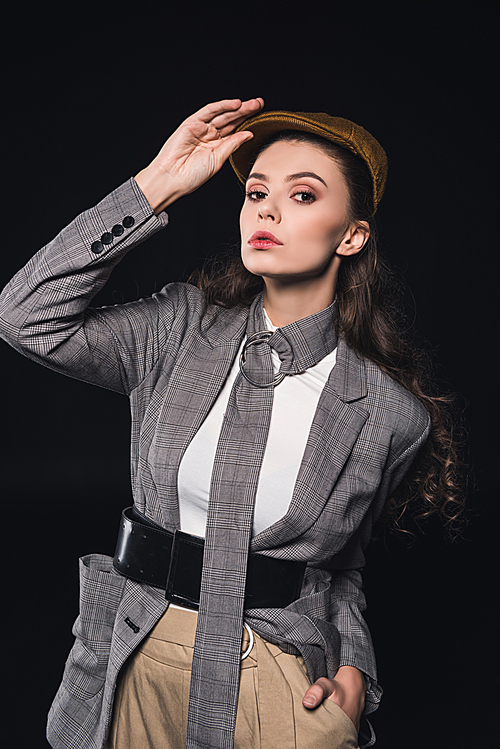 portrait of elegant young woman  isolated on black