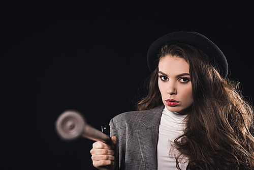 close-up view of stylish woman with walking stick  isolated on black