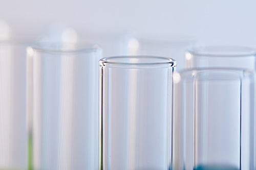 close up view of glass test tubes isolated on white