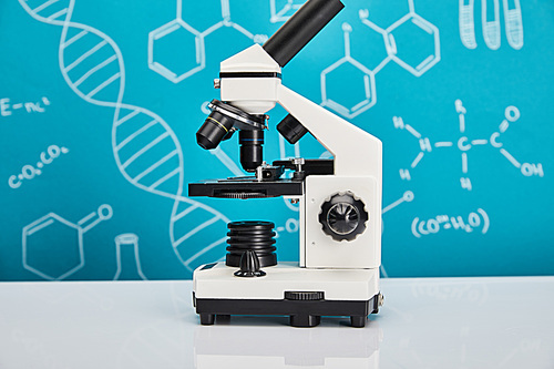 microscope on blue background with molecular structure