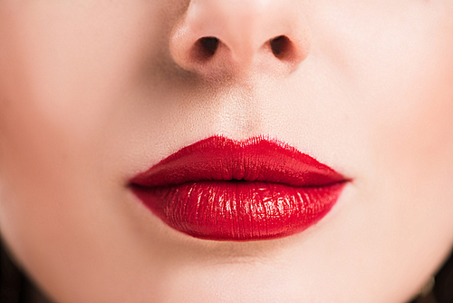cropped image of woman with red lips and clean skin