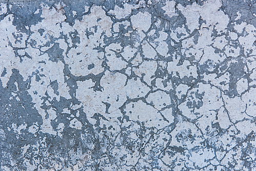 scratched weathered blue wall textured background
