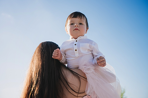 mother holding adorable little son