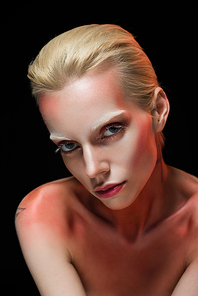 attractive fashionable girl with makeup, isolated on black