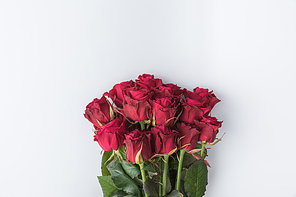 top view of bouquet of red roses isolated on white