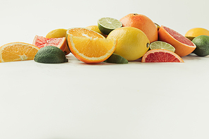 Assorted juicy citruses isolated on white