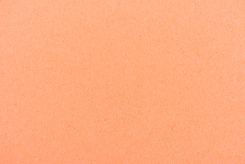 texture of peach-orange color paper as background
