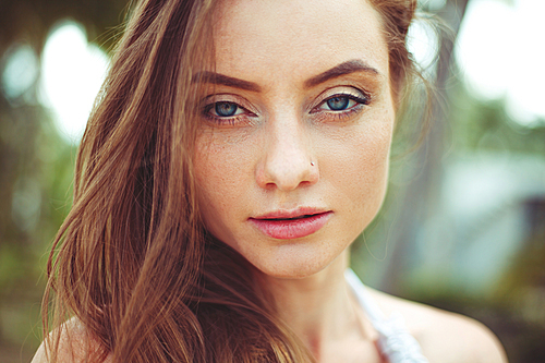 portrait of attractive young woman with long hair 