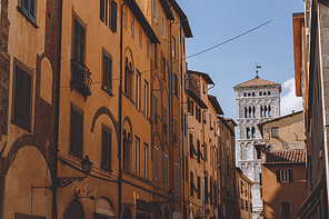 old street with ancient buildings in Pisa, Italy