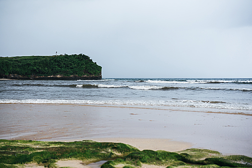 scenic view of ocean and empty coast in ubud, bali, indonesia