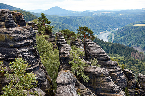 aerial view of beautiful landscape with old rocks, river and forest in Bastei, Germany