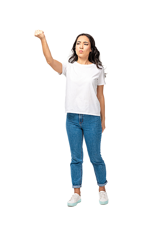 Angry young asian woman showing raised fist isolated on white