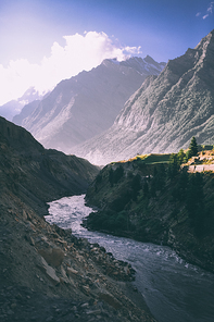 beautiful mountain river in valley and majestic mountains in indian himalayas, keylong region