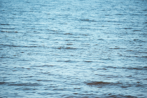 full frame image of wavy blue sea background