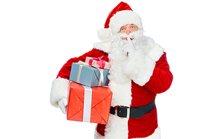 santa claus with christmas presents showing silence symbol isolated on white