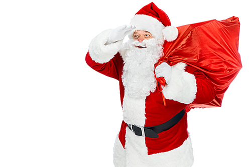 bearded santa claus with red christmas bag looking away isolated on white