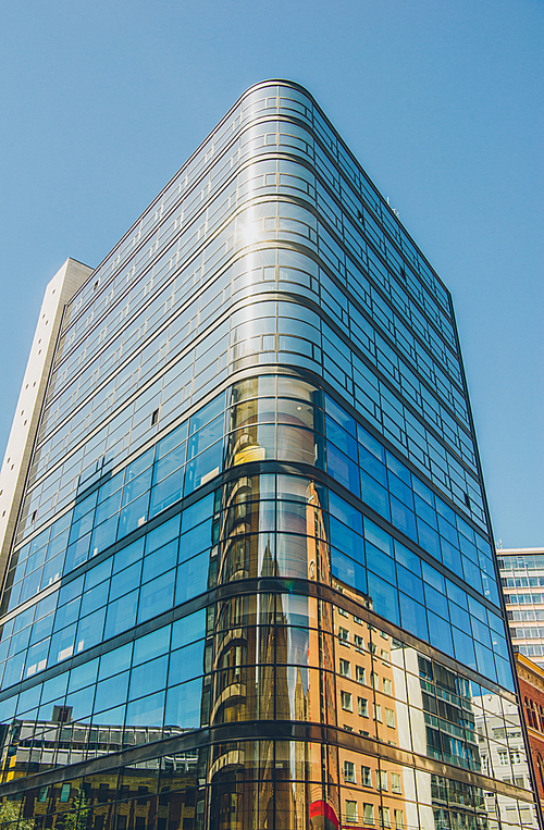 low angle view of modern office building against blue sky, oslo, norway