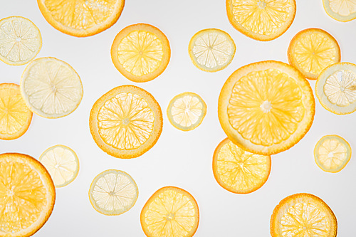bright orange and lemon slices on grey background