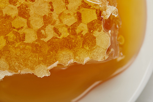 background of delicious raw textured Honeycomb on plate